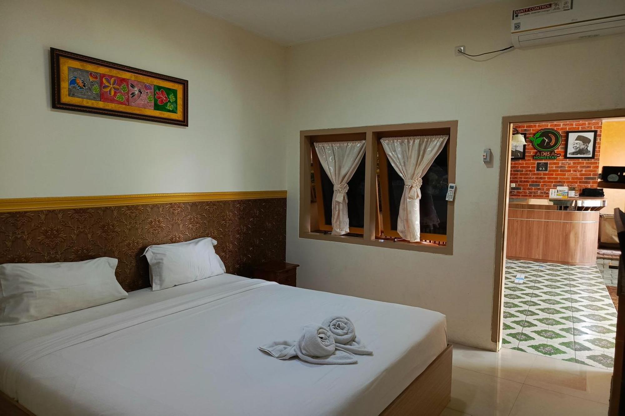 Adisa Homestay Malang Extérieur photo